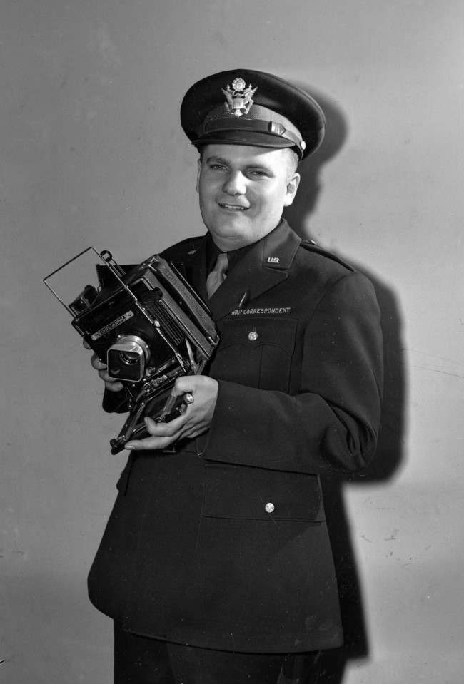 #13 Harold Harris, Associated Press staff photographer and war correspondent assigned to the London bureau, is seen. 1944
