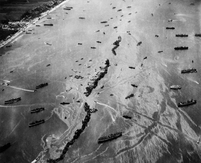 #2 Thirteen Liberty ships, scuttled to form a breakwater for invasion vessels landing on the Normandy beachhead, 1944.