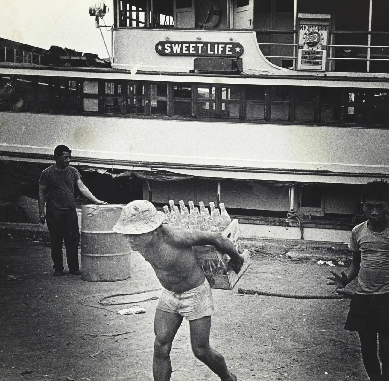 #16 Docker near the passenger ship Sweet Life, Cebu city. Philippines, 1959