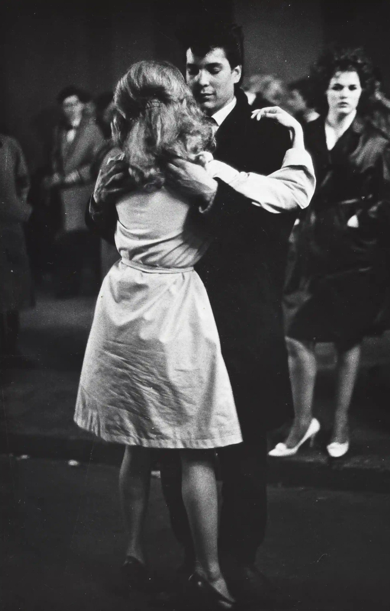 #4 Dancing couple on the Zeedijk during the annual fair, Amsterdam, May 1961