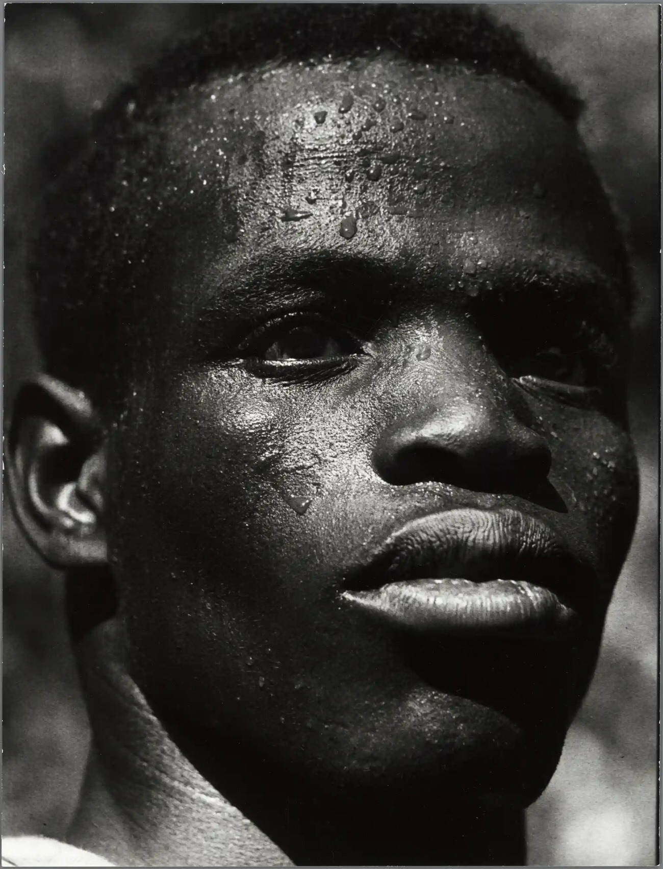 #6 N’Gabé, a 23 year old caravan porter. Oubangui-Chari (now Central African Republic, 1956-1957)
