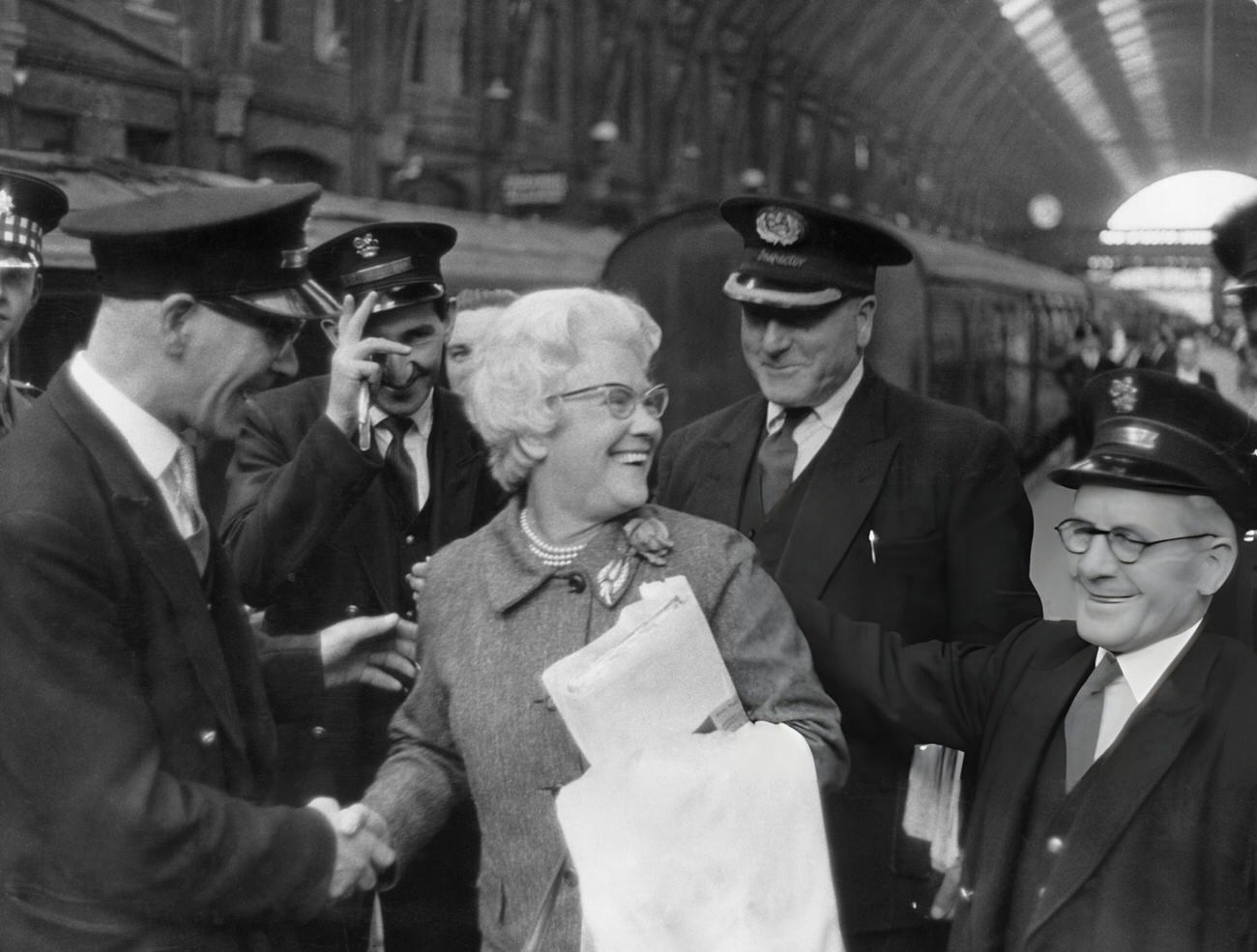 Cissie Charlton is greeted by station staff at King’s Cross, London, 1966.