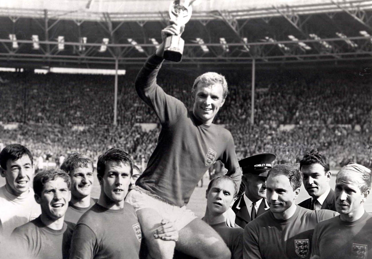 England’s captain Bobby Moore holds aloft the Jules Rimet World Cup trophy, 1966.