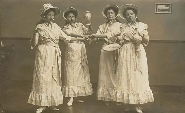 #8 Young women hold fancy china ready for their tea party.