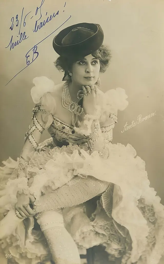 #3 A costumed girl poses in a cap, circa 1910.