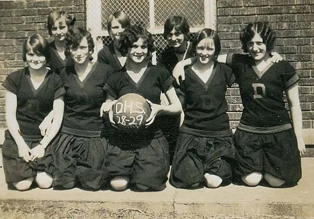 #21 1920s flappers playing basketball.