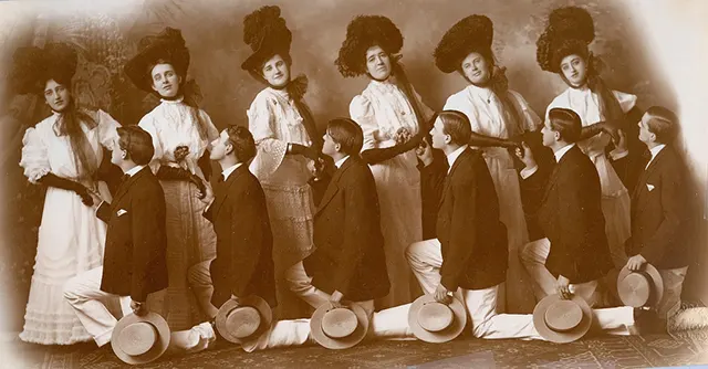 #11 Women and their proposing men, many look uninterested.