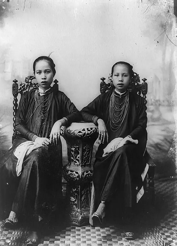 #35 Two women posed, seated, Saigon, South Vietnam, 1890-1923.