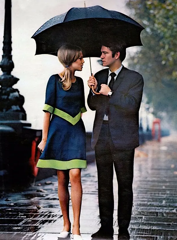 #23 A stylish couple enjoying the romantic rain in London, 1963.