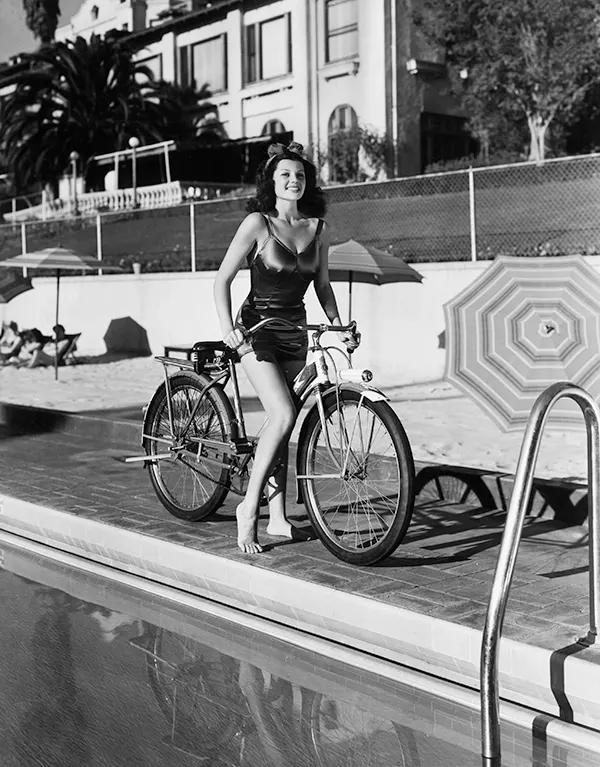 #35 Rita Hayworth looking hot on her bicycle, 1940s.