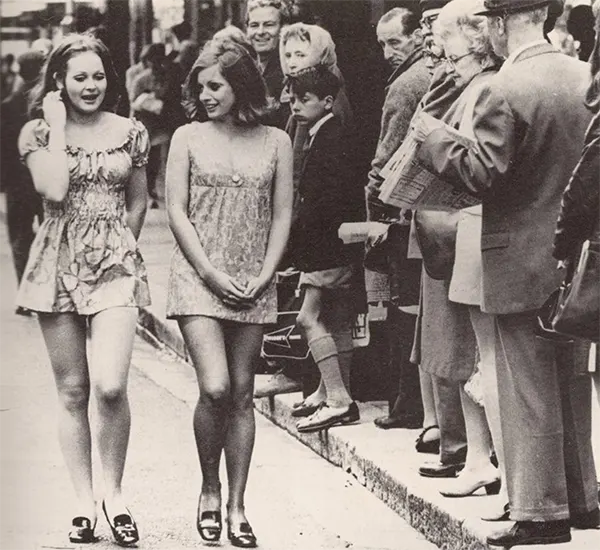 #41 Two girls walking down the street in Cape Town, 1965.