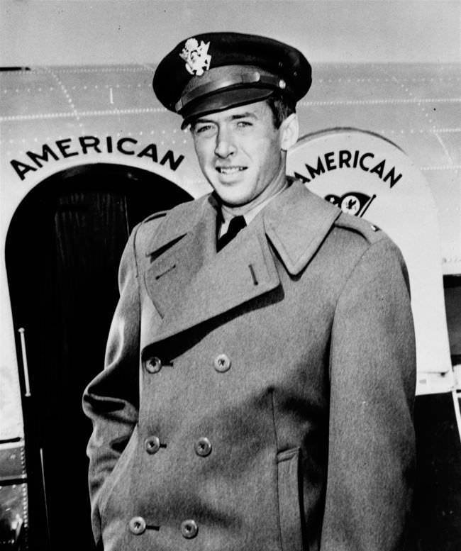 #10 Lt. James Stewart, former film star and now in the U.S. Army Air Corps, steps from the transcontinental “Mercury” of American Airlines at LaGuardia Field, New York, after a flight from the west coast, February 20, 1942.