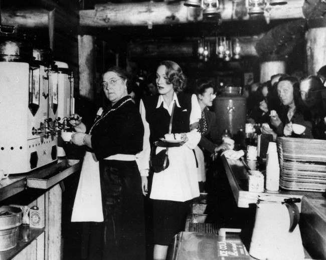 #17 Mrs. Alleta Sullivan, left, mother of the five Sullivan brothers who lost their lives in the sinking of the cruiser USS Juneau, works alongside actress Marlene Dietrich as they serve servicemen in the United Service Organizations (USO) Hollywood Canteen, Ca., Feb. 9, 1944.