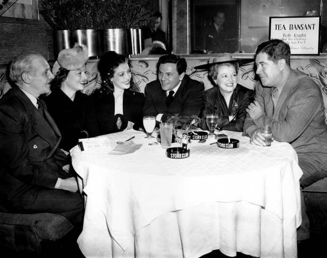 #9 Writers and movie stars gather at New York’s Stork Club, March 8, 1942, as they prepare for a World War II Navy Relief Show, two days away, at Madison Square Garden.