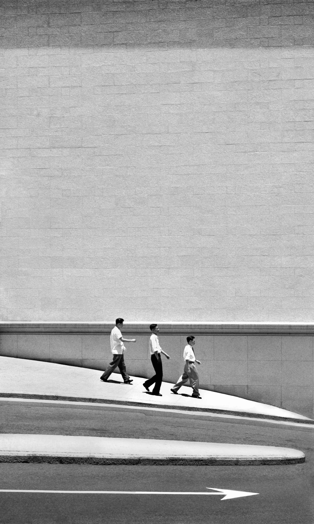#8 Three Men Walking, Hong Kong, 1960s.