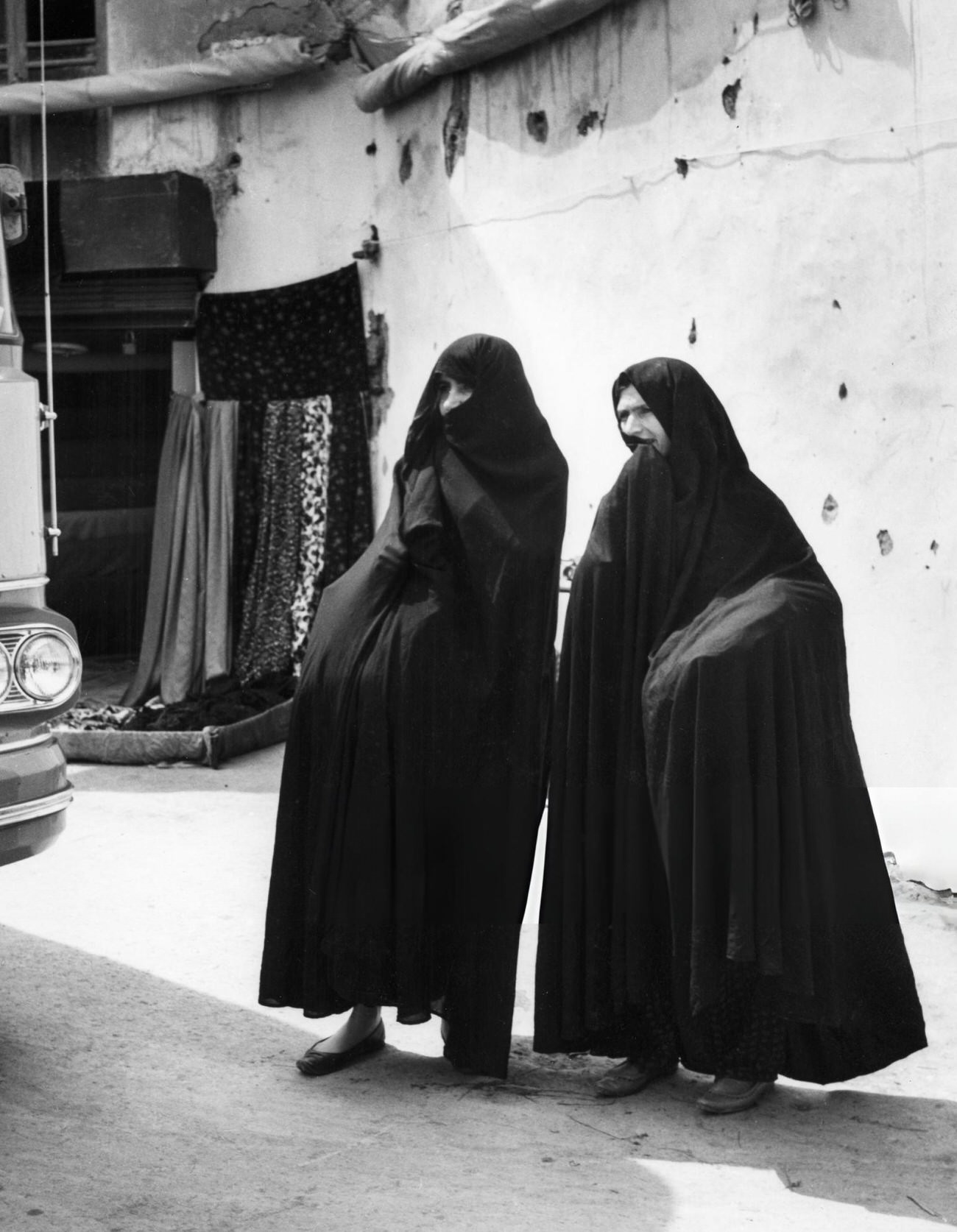 #44 Veiled women walking in the streets of Tehran, Iran, 1960s.