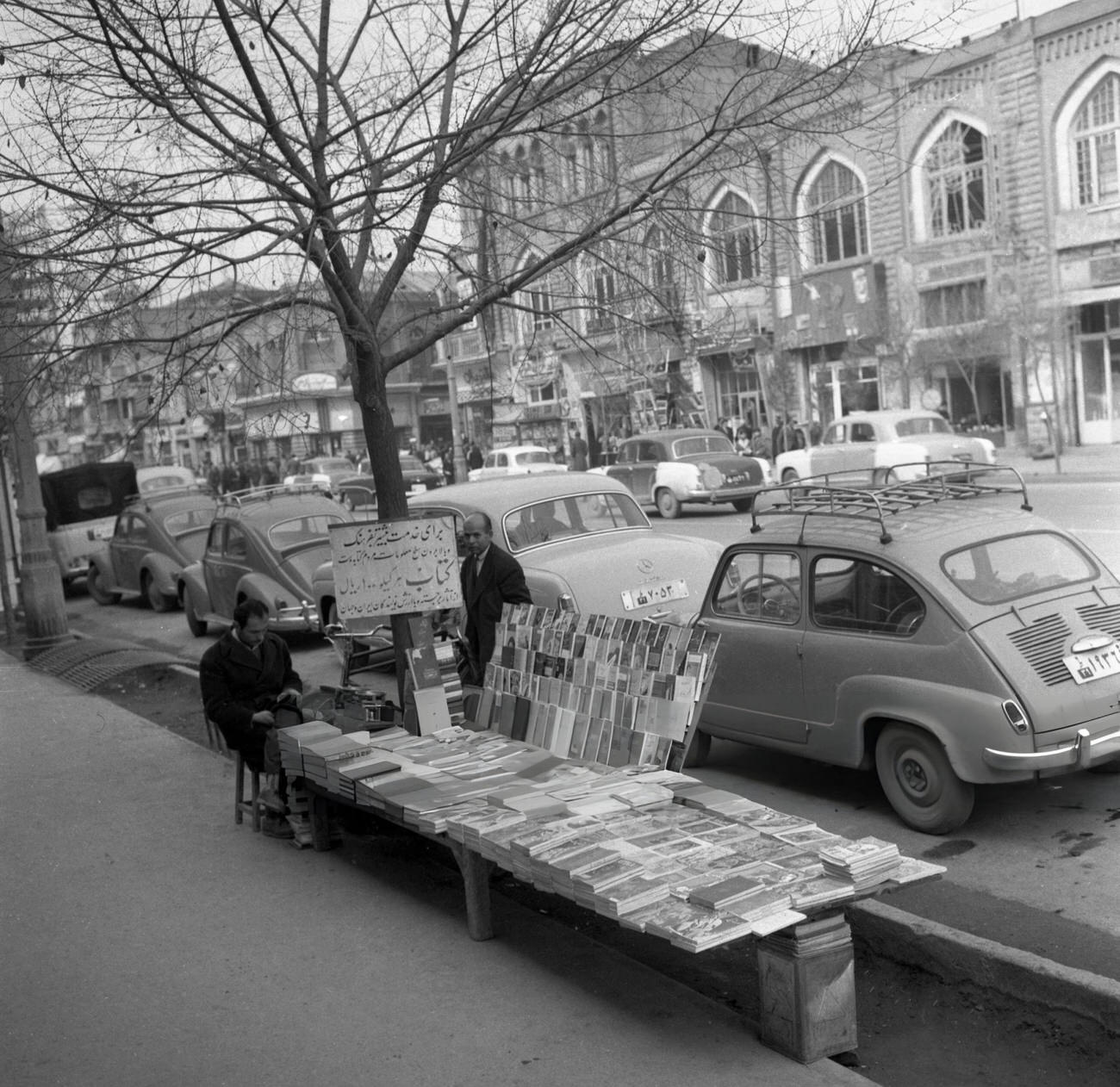 #34 A book seller on a street in Tehran, Iran, 1964.