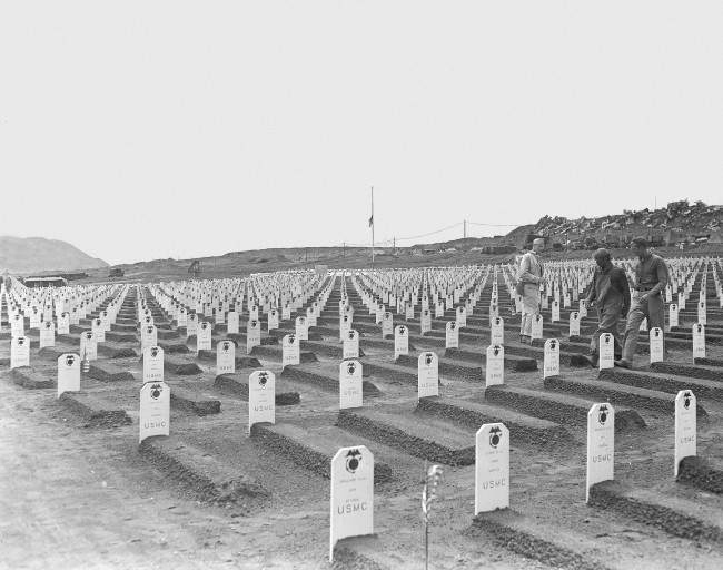 #44 White markers designate the final resting place for hundreds of Third and Fourth Marine Division fighters, who died during invasion of Iwo Jima in World War II, in this cemetery located near the beach where the U.S. Marines first established a beachhead, 1945.