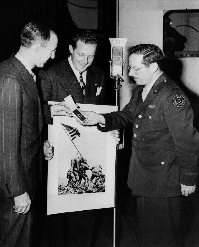 #9 Joe Rosenthal, Associated Press photographer whose shot of the flag raising on Iwo Jima has become a classic, received further recognition when he was awarded the Graflex Diamond Award during an appearance on the “We, The People” television broadcast, 1945.