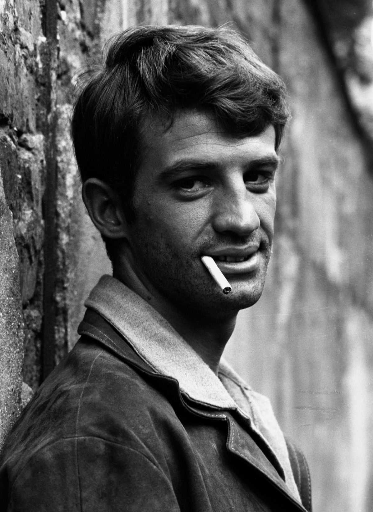 #11 Raymond Cauchetier and Jean-Paul Belmondo on the set of ‘A bout de Souffle’ directed by Jean-Luc Godard, 1960.