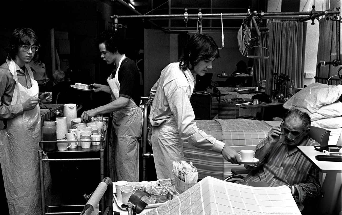 #2 Pupils from Westminster City School, London help to serve food and drinks to patients at London’s Westminster Hospital, 1972.