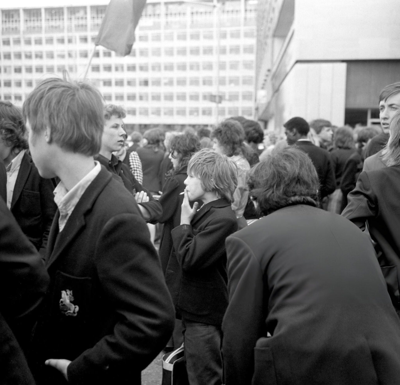 #25 A schoolboy smokes as a ‘pupil power’ demonstration breaks up near County Hall following a rally in Hyde Park, 1972.