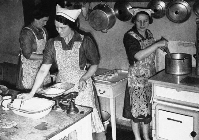 #10 Voluntary workers in the communal kitchen preparing meals, some of which will be eaten by employees in nearby factories in London on Sept. 17, 1941.