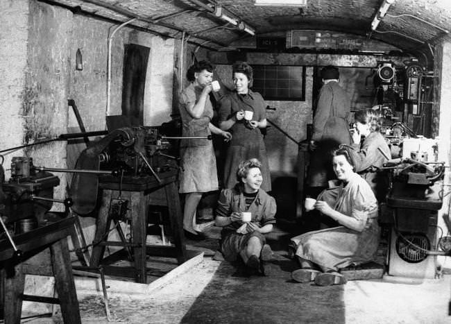 #30 Time out for a cup of tea during a five-minute morning break in the underground factory in England April 11, 1944.