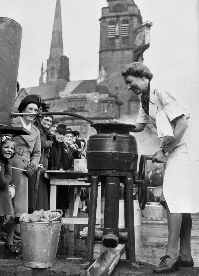 #34 A lady operates a semi-mobile canteen on the streets of Coventry following Lord Woolton’s statement that the Ministry of Food had completed arrangements for feeding 20 percent of the population of Great Britain and Northern Ireland in the event of an emergency.
