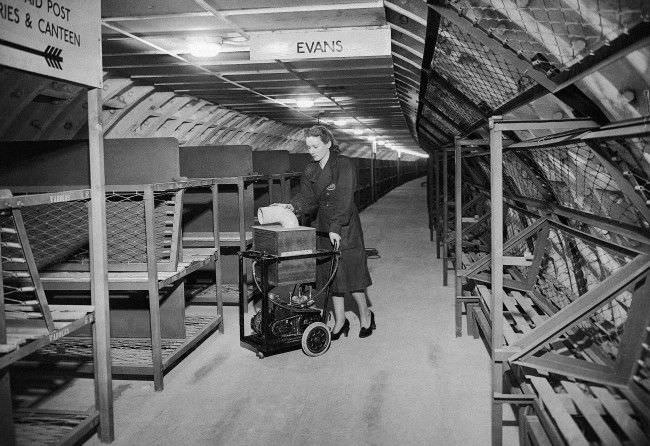 #41 London’s new tunnel shelters, built below tube stations, are now practically completed.