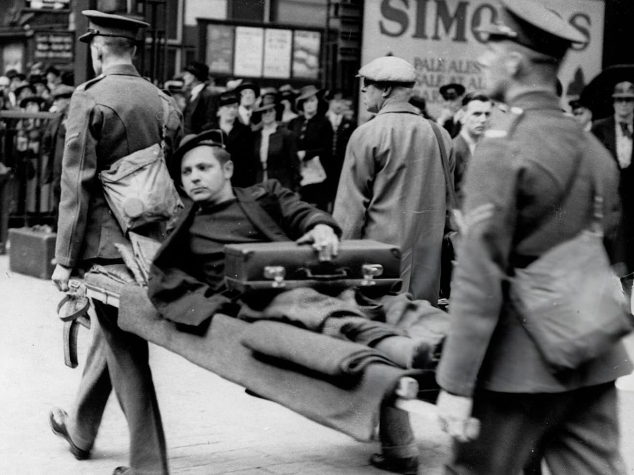 #22 A wounded French sailor arrives in Britain, 1940.