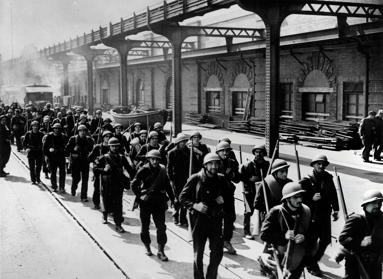 #37 French marines and soldiers arriving in a south coast town in England after evacuation from Dunkirk, 1940.