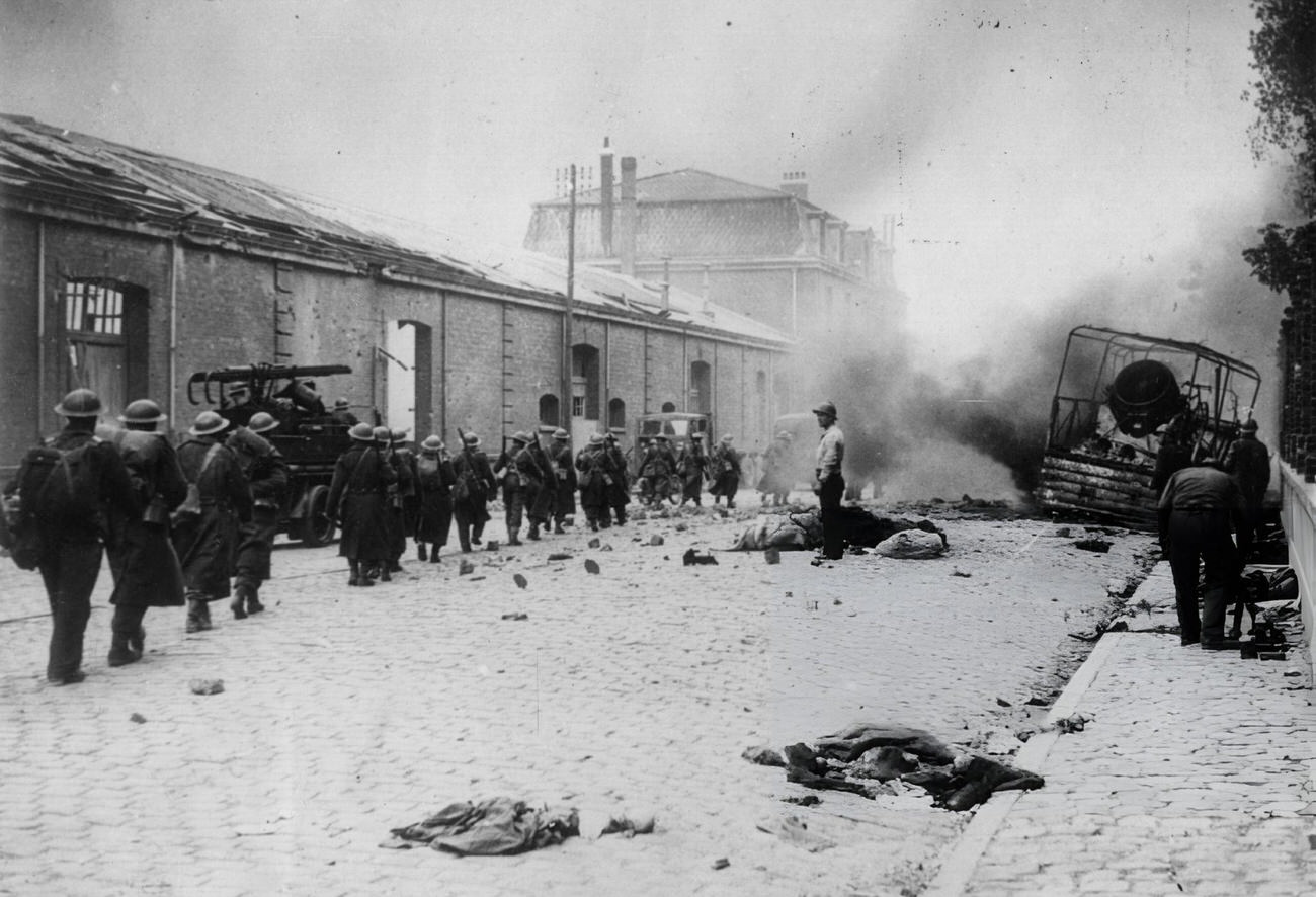 #40 A street in Dunkirk under heavy bombardment during the German attempt to take the town before the evacuation of the allied armies, 1940.