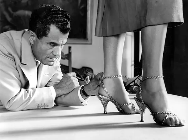 #3 Salvatore Ferragamo with his gold sandal, 1956.