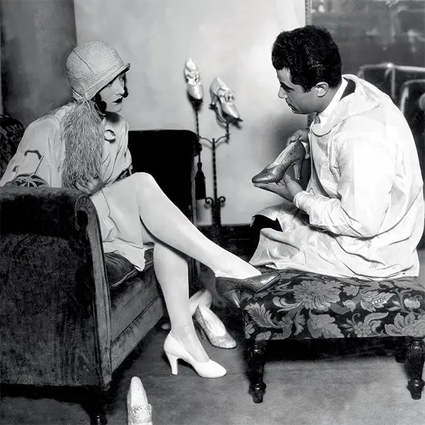 #4 Actor Joan Crawford and Salvatore Ferragamo at the Hollywood Boot Shop, 1920s.