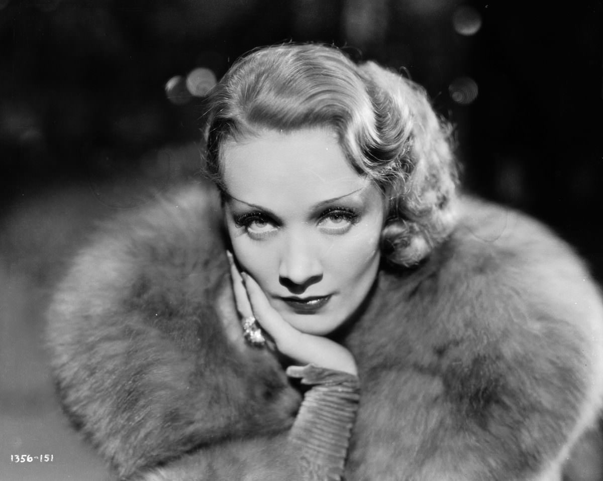 #16 1932: Marlene Dietrich (1901 – 1992) as Madeline or Shanghai Lily in the film ‘Shanghai Express’, directed by Josef von Sternberg. Costumes by Travis Banton.