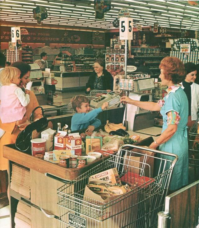 #6 Paying for groceries, circa mid-1960s.