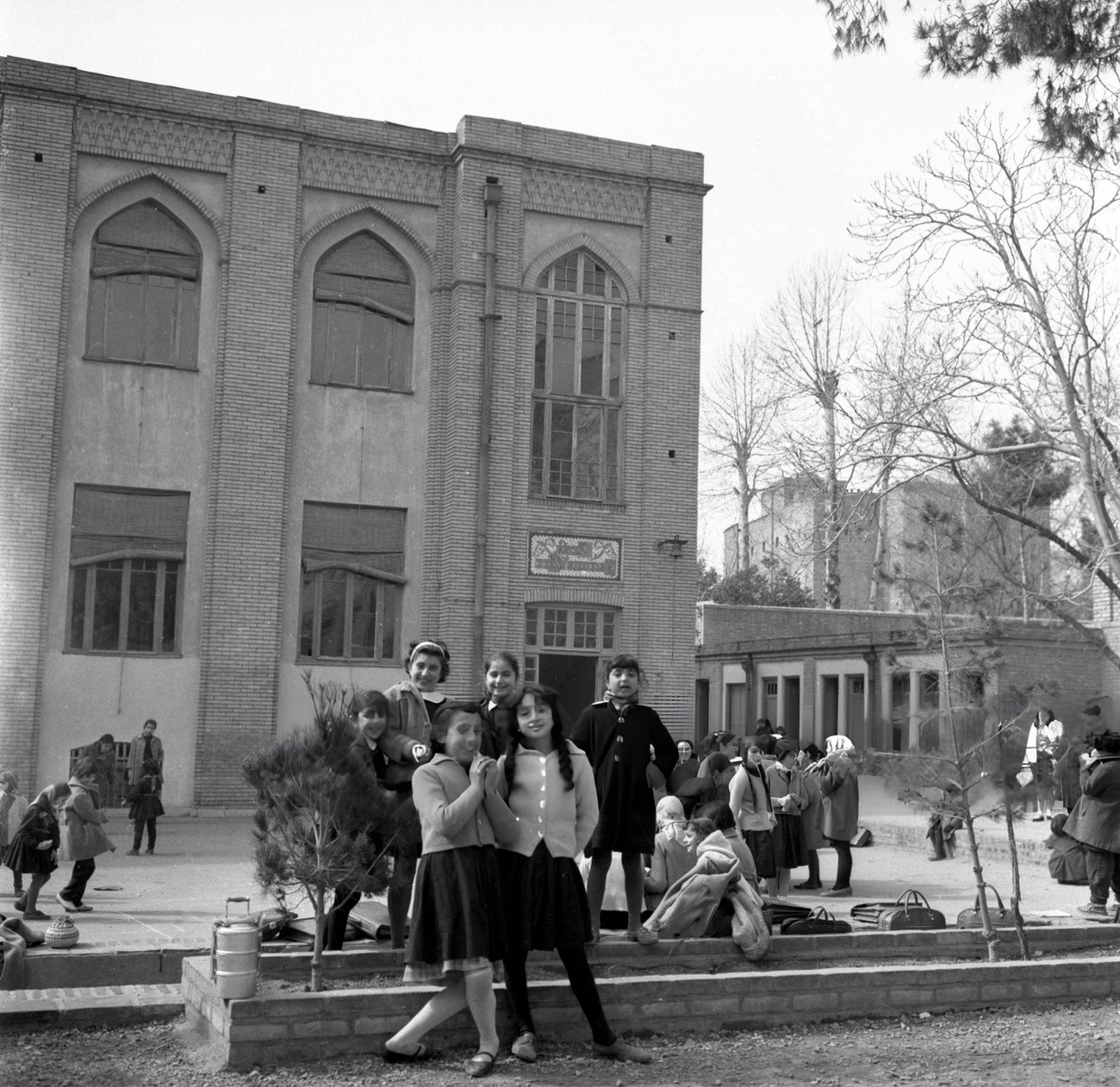 #34 Children in a schoolyard in Tehran, 1964.