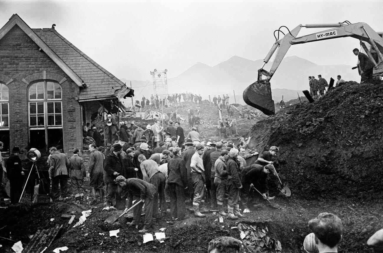 #65 Mud and devastation caused by mining spoil from the hillside engulfing the Pantglas Junior School, 1966.