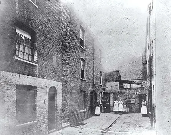 #16 Residents at Boundary Street, located in the Old Nichols slum.