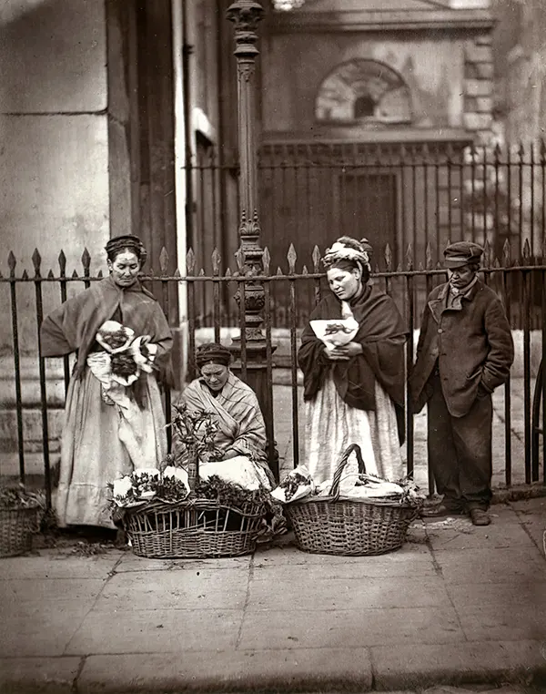 #26 Poor women selling flowers at Covent Garden. Circa 1877.