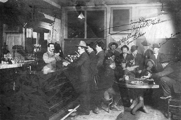#26 Dewar’s Saloon in Zortman, Montana, 1905.
