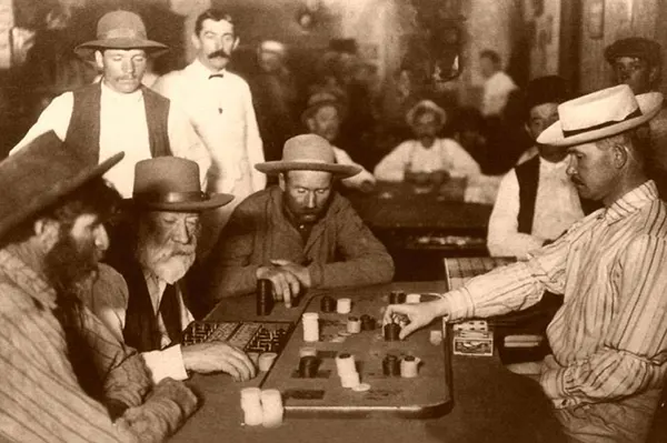 #37 Gamblers play Faro in an Arizona saloon, 1895.