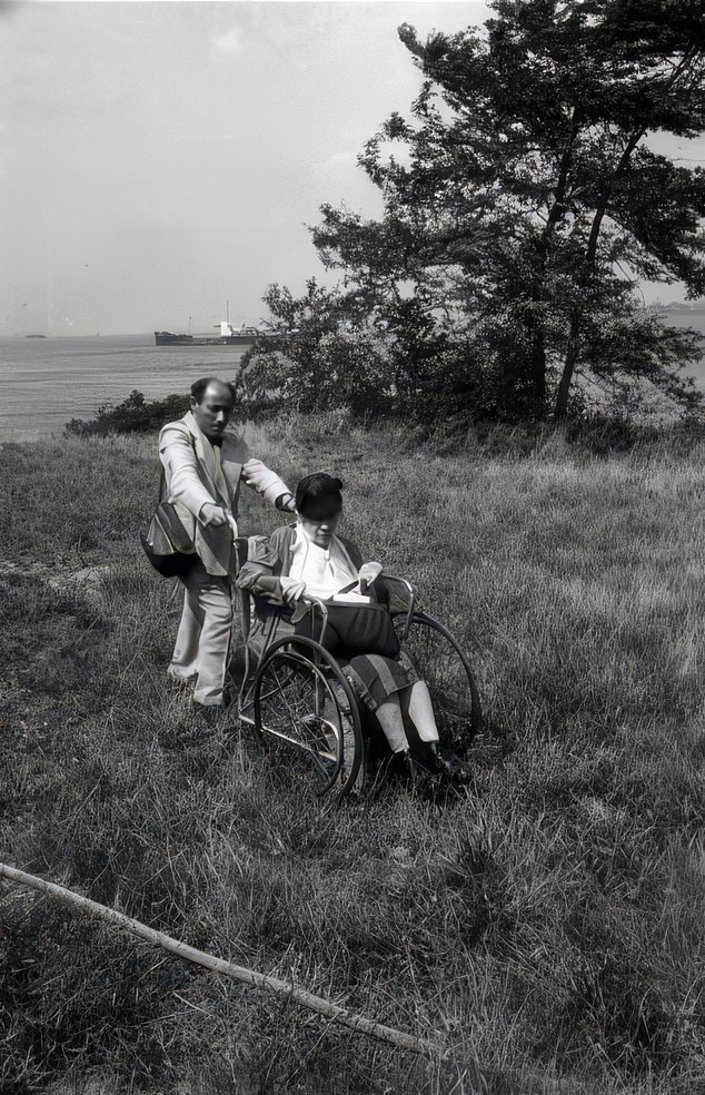 #10 Alfred Eisenstaedt pushes photographer Alice Austen in a wheelchair, Staten Island, New York, in 1951, one year before Austen died.