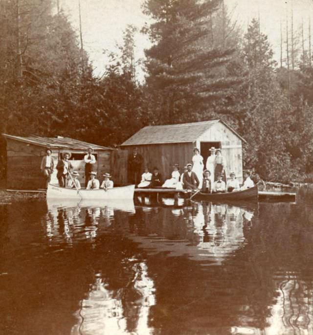 #13 Canoes at the boathouse on the lake, possibly from the Muskokas or Lake Simcoe