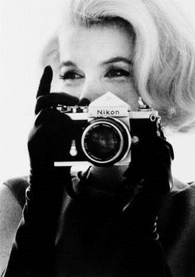 #14 Marilyn Monroe with a Nikon camera