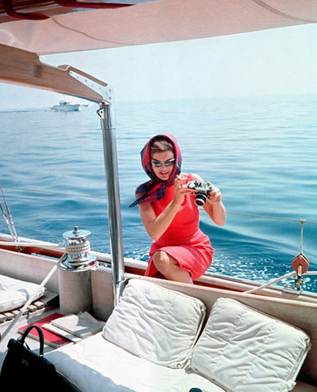 #27 Jacqueline Kennedy Onassis with an SLR