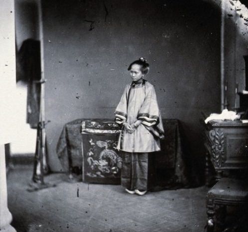 #7 The woman in this photograph from around 1868 seems to be in a reflective mood.