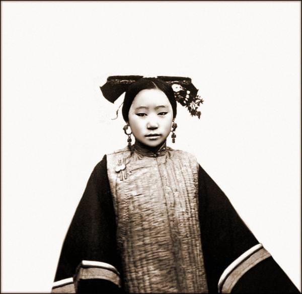 #8 This lovely looking lady could be either Tartar or Manchu.