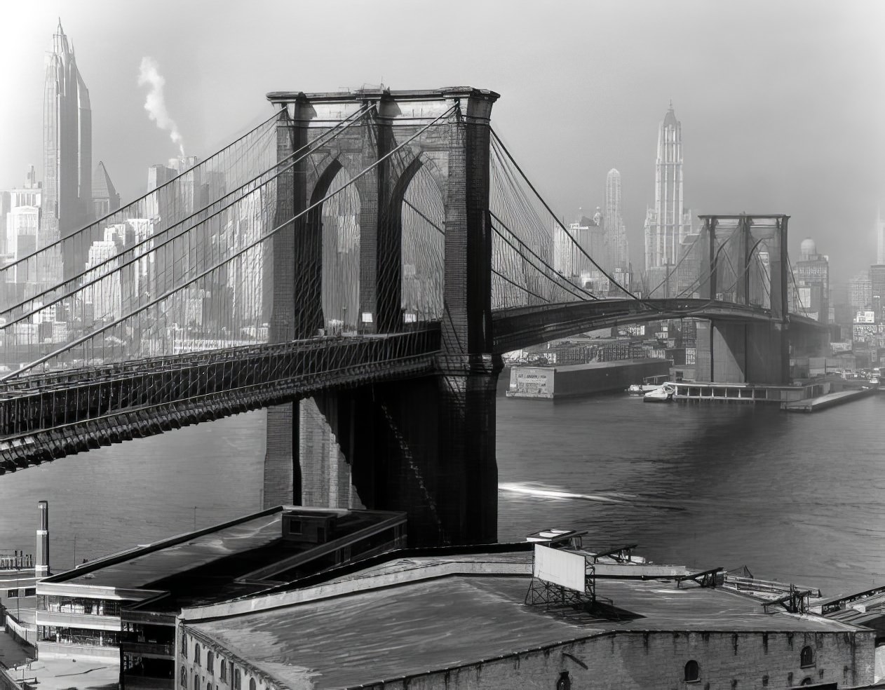 #18 The Brooklyn Bridge arches toward Lower Manhattan, 1948